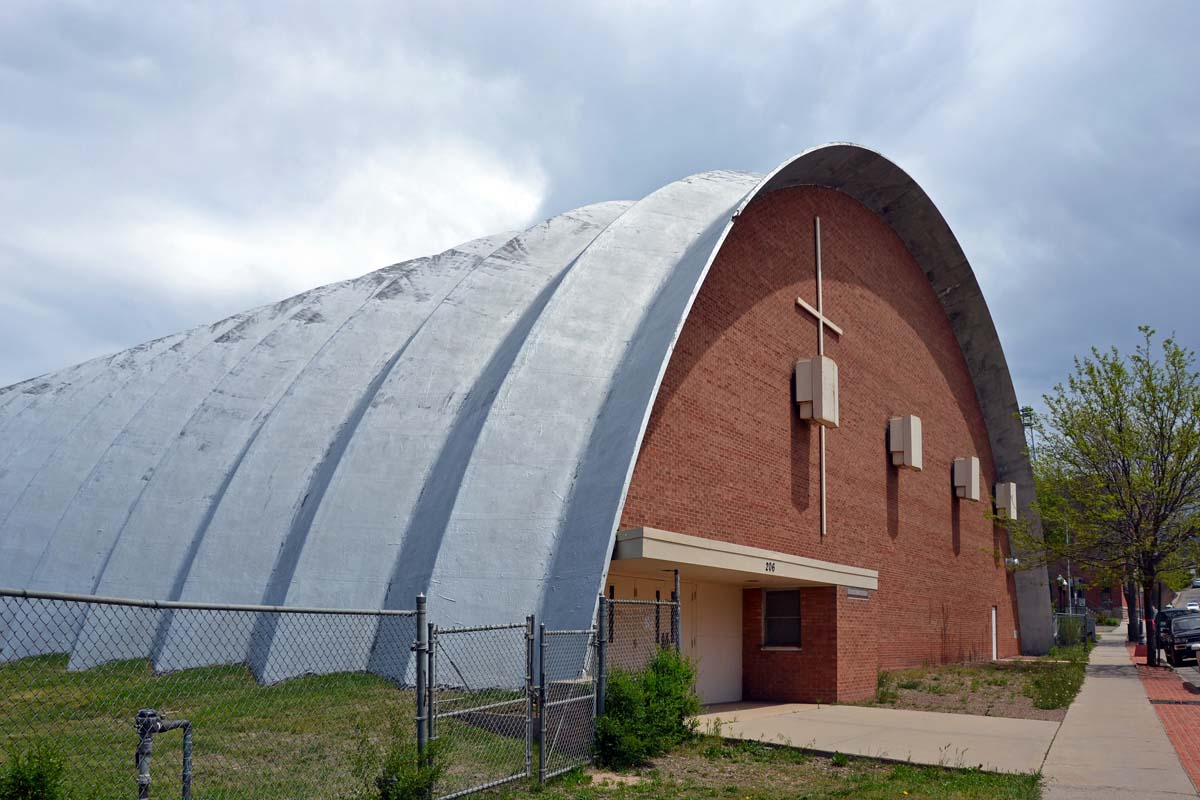 General view 1 of Holy Trinidad High School Gym showing the thin-shell concrete roof in May 2017.