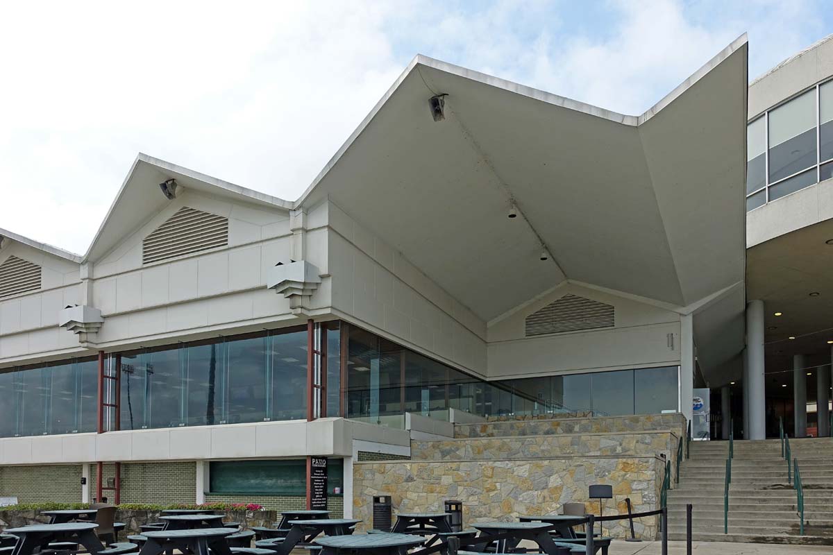 General view 2 of the Scioto Downs large building with folded-plate concrete roof in July 2019.