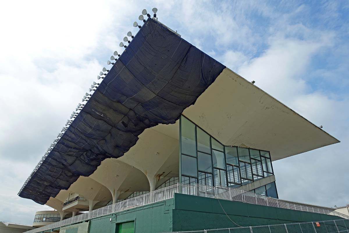 General view 4 of the Scioto Downs grandstand showing the thin-shell concrete roof in July 2019.